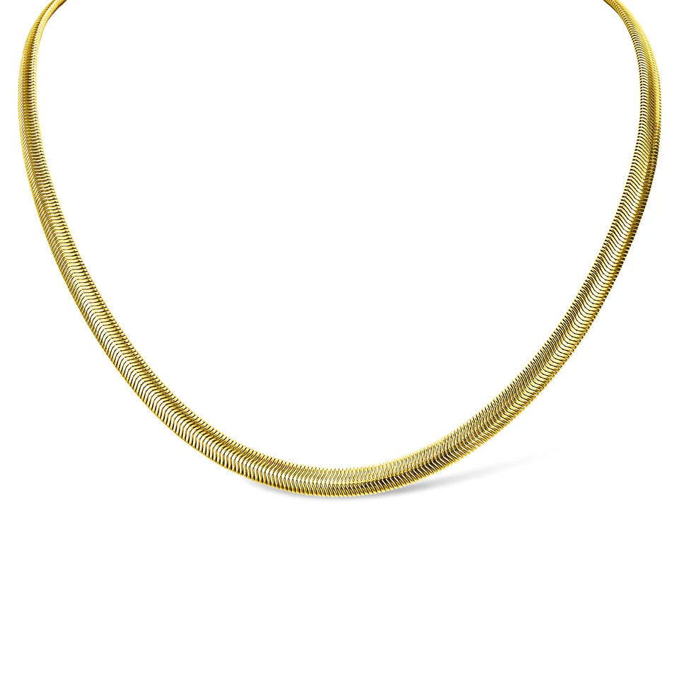 Gold snake chain link necklace on a white background