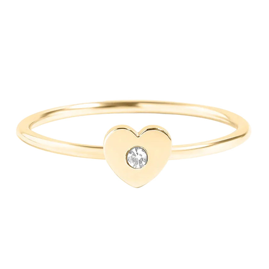 Gold heart-shaped ring with a diamond on a white background