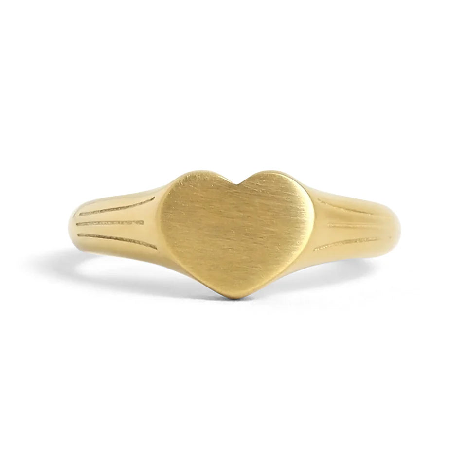 heart signet ring on a white background
