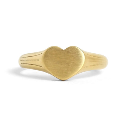 heart signet ring on a white background